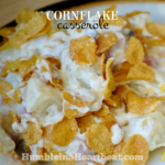 Cornflake Casserole is the ultimate comfort food. Potatoes, cheese, ham, sour cream, cornflakes. What's not to love?
