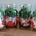 Mason jar salads help ensure that you are eating a healthy lunch every day, and this tomato onion salad is perfect for using up leftover BBQ meat you have in your fridge.