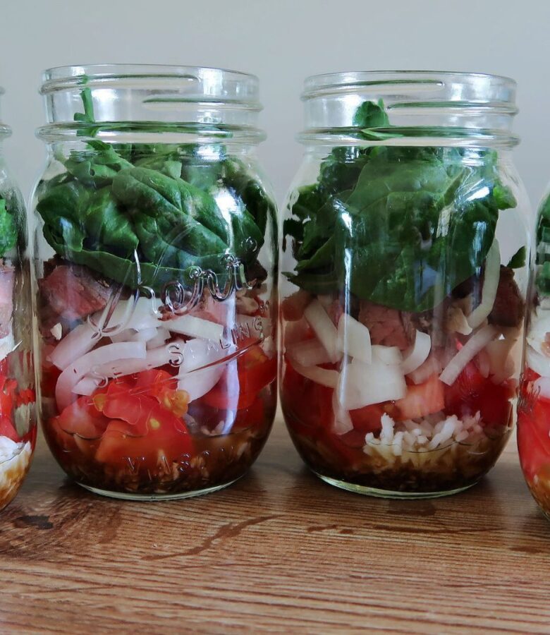 Mason jar salads help ensure that you are eating a healthy lunch every day, and this tomato onion salad is perfect for using up leftover BBQ meat you have in your fridge.